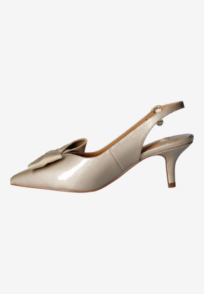 Left side view of Devika TAUPE PATENT