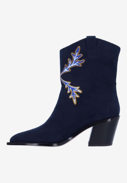 Left side view of Skyla NAVY/RED EMBROIDERED SUEDE