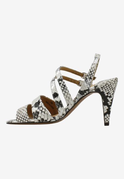 Left side view of Uliana Cream/Black/Silver