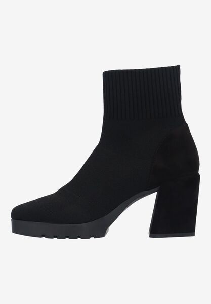 Left side view of Poreli BLACK STRETCH KNIT
